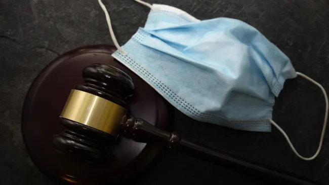 covid mask and judge gavel